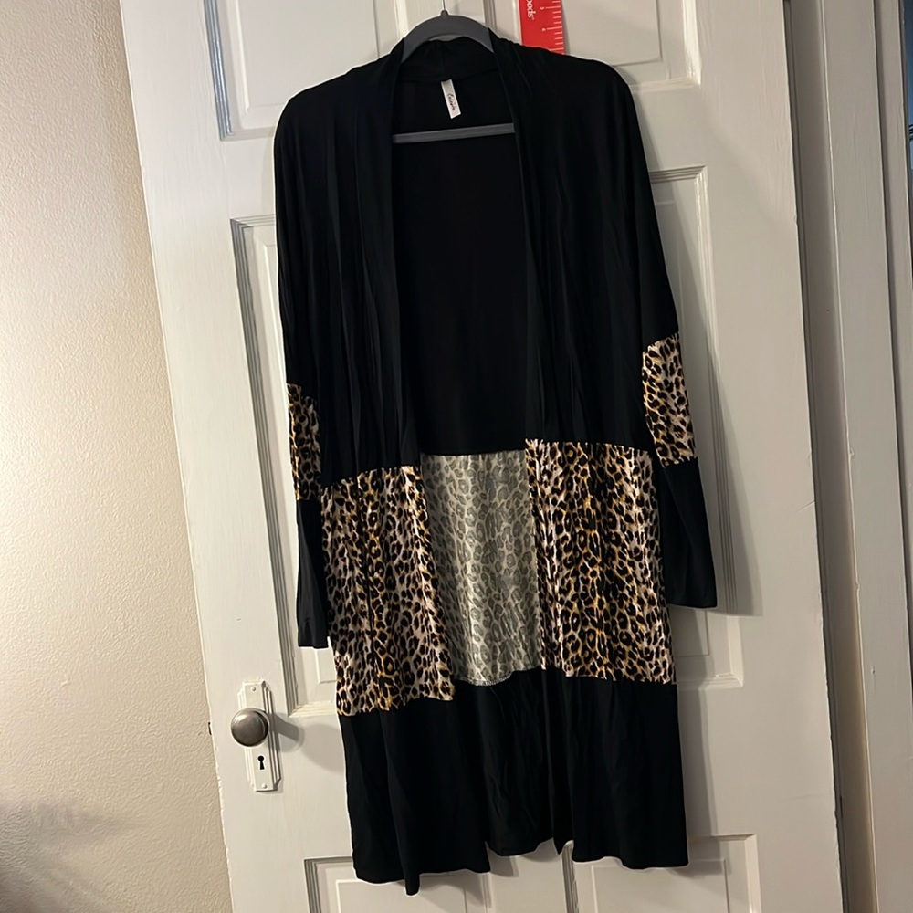 Lightweight open front animal print cardigan.